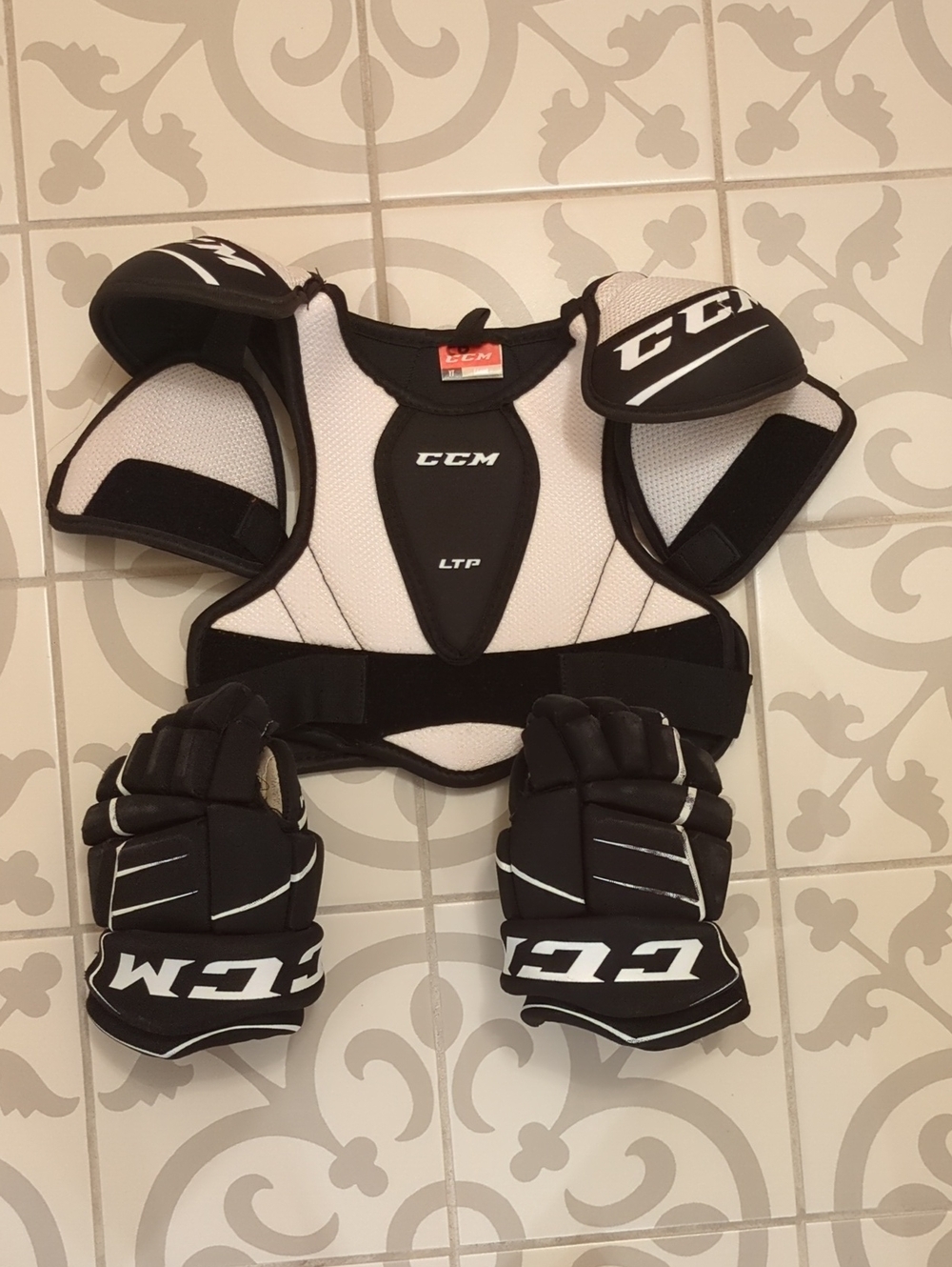 CCM Youth White and Black Hockey Shoulder Pads with Gloves